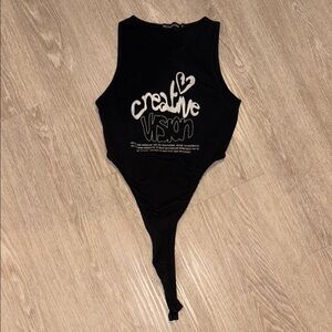 PrettyLittleThing Black and Cream Bodysuit NWOT